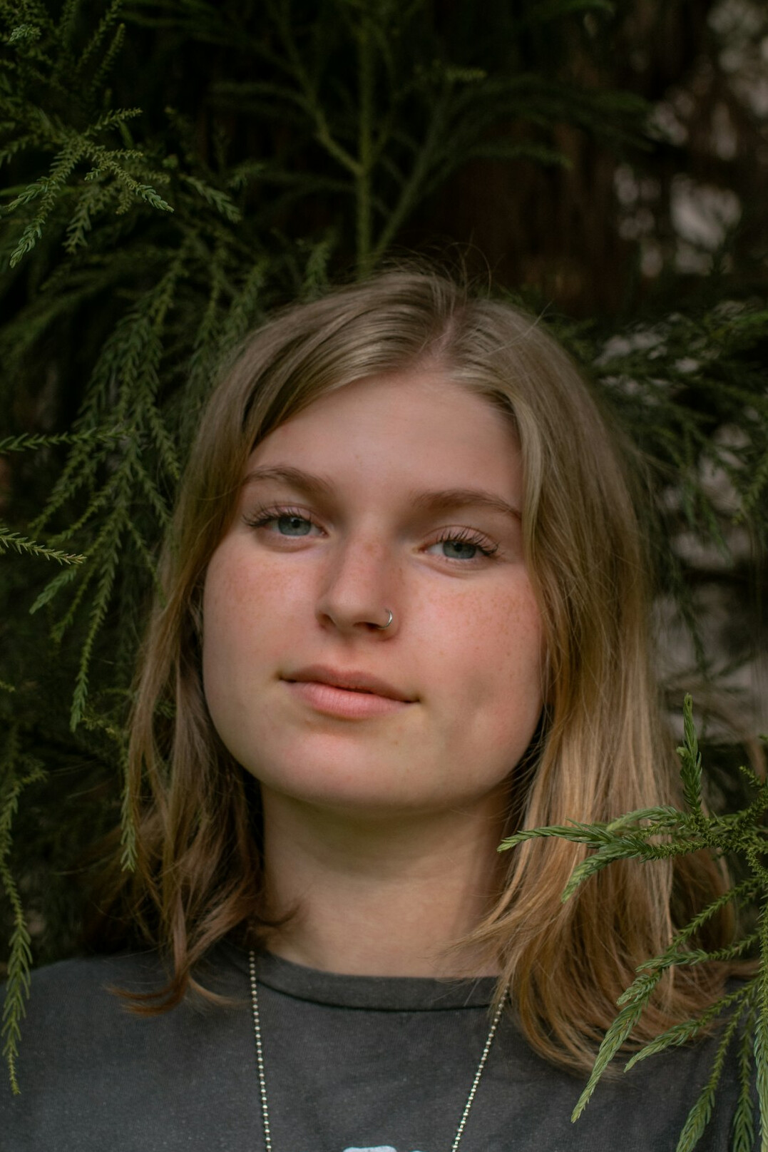 Portrait of a woman with light hair smiling