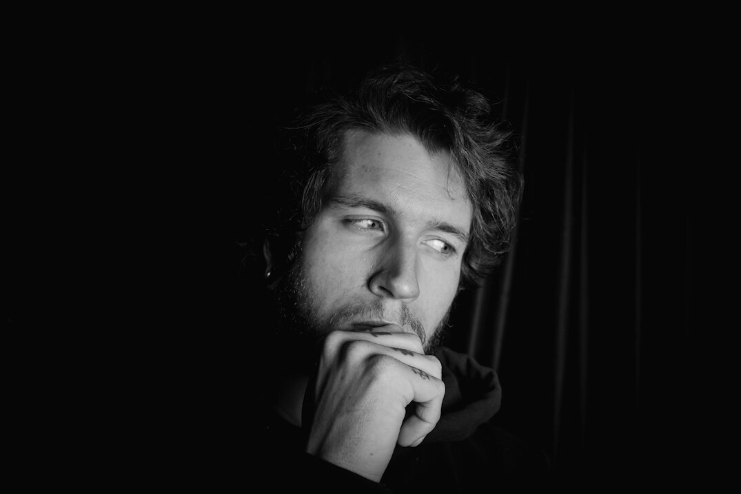 Portrait of a bearded man looking at the camera